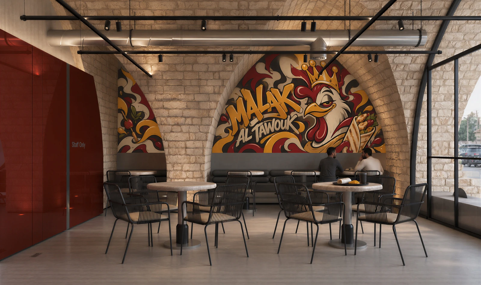 Dining room with Malak Al Tawouk graffiti above the banquette and the red glass wall retained